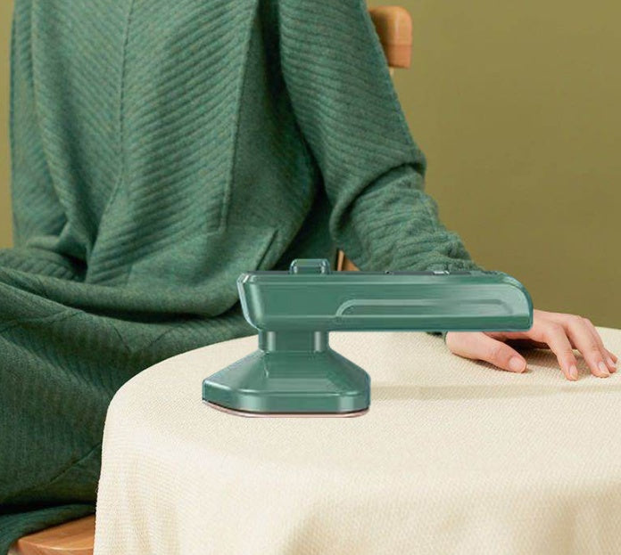 Portable handheld steam iron for quick, efficient wet/dry ironing. - My Store